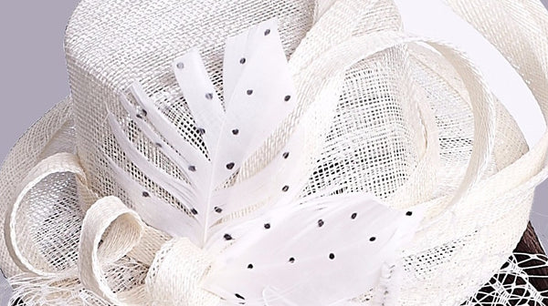 Ivory Fascinator Hat With Birdcage Veil & Dotted Feather